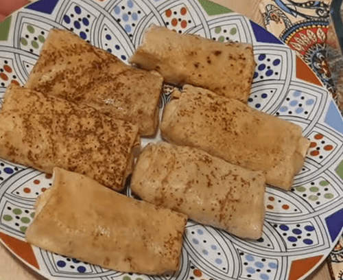 Блинчики с начинкой из грибов в сливочном соусе